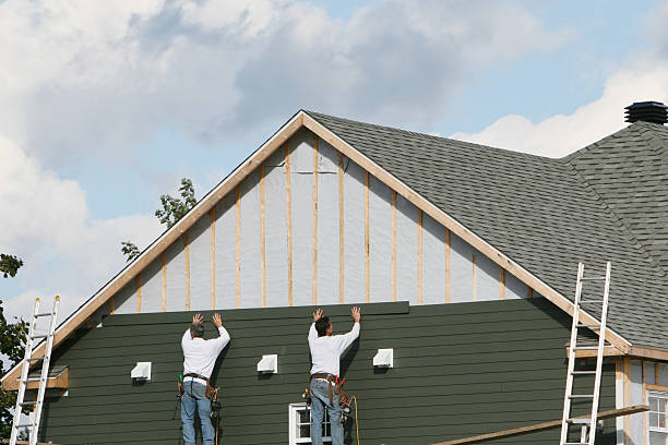 Professional Siding Installation technician working in Tomball, TX